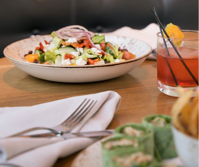 Salad on plate at Corsair Miami